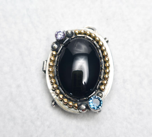 Sterling Silver with 14k Gold Locket