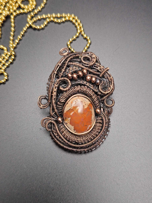 Fire Opal Pendant – Intricate Copper Wire Weave for Energy & Style